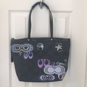 Coach Bag with Sunglasses Details